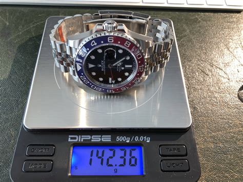 rolex submariner weight grams